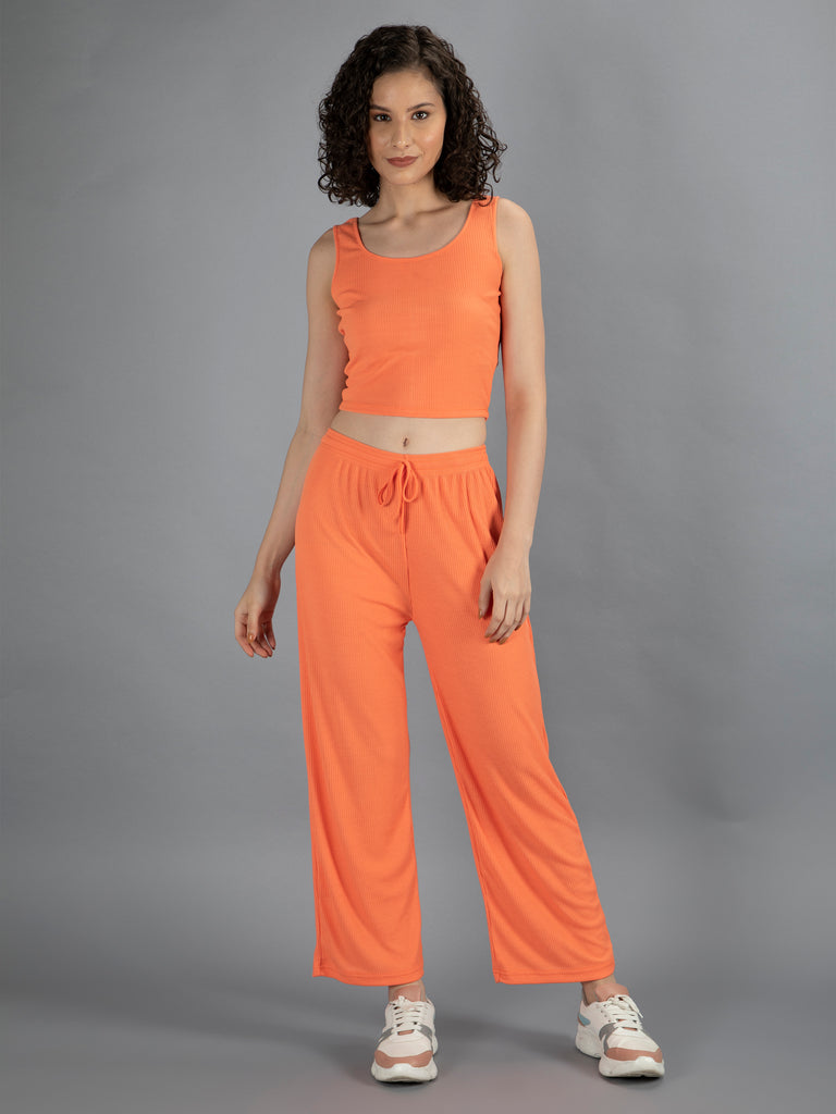 neudis-women-orange-regular-fit-solid-ribbed-parallel-track-pants